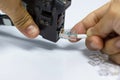 Technician to install an RJ45 connector on a CAT5 Royalty Free Stock Photo