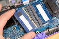 Installing new RAM memory chips to laptop Royalty Free Stock Photo