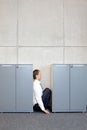 Technician in white uniform with bucket opening industrial process tank Royalty Free Stock Photo