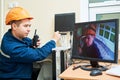 Technician worker adjusting video surveillance system