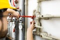 Technician worker doing maintenance jobs for heating syste Royalty Free Stock Photo
