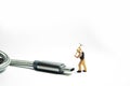 Technician worker figure standing in front of usb USB type C cable. IT support concept Royalty Free Stock Photo