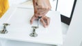 Technician Worker Fixing The Door Lock With Screwdriver in to wood. creating new things At Home, renovation and installing concept Royalty Free Stock Photo