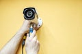 Technician worker installing video CCTV camera Royalty Free Stock Photo