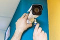 Technician worker installing video CCTV camera Royalty Free Stock Photo