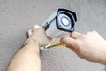 Technician worker installing video CCTV camera Royalty Free Stock Photo