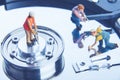 Technician workers repairing hard disk drive. Computer service concept. Royalty Free Stock Photo