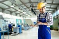 Technician working in factory and doing quality control Royalty Free Stock Photo