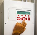 A technician works box panel system fire