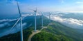 Technicians conduct maintenance on a wind turbine inspecting blades and checking electrical Royalty Free Stock Photo