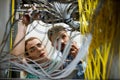 Technicians fixing cable Royalty Free Stock Photo