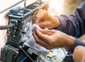 Technicians install cabinet on fiber optic cable. Royalty Free Stock Photo