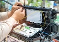 Technicians are installing fiber optic cabinets. Royalty Free Stock Photo