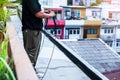 Technicians are installing fiber optic cables for internet on the rooftop Royalty Free Stock Photo