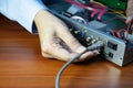 Technicians installing LAN cables at CCTV camera recorders Royalty Free Stock Photo