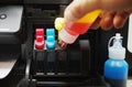 Technicians Refill Ink Cartridges, Printer Inkjet Colors.Printer Repairs And Maintenance Inkjet Or Laser Printers Concept