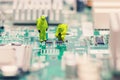 Technicians repairing circuit board