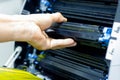 Technicians replacing toner in laser printer concept office supplies repair