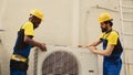Technicians teamworking on hvac system