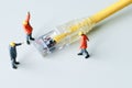 Technicians try to repair cable wire network.