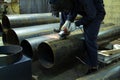 Technicians use steel cutting tools to cut steel. Metal cutting. The worker uses gas to cut steel Royalty Free Stock Photo