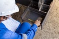 Technicians are using measuring tape to checking the accuracy of the steel structure Royalty Free Stock Photo