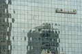 Technicians Work On A Skyscraper In An American City