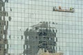 Technicians Work On A Skyscraper In An American City