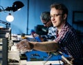Technicians working on electronics parts Royalty Free Stock Photo