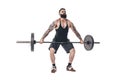 The technique of doing an exercise of deadlift with a barbell of a young strong bearded sports men on a white isolated Royalty Free Stock Photo