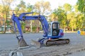 Technique for the repair of roads. Small crawler excavator