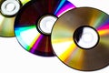 Technological background created with the photo of cd, the light accentuates the reflections coloring them. Royalty Free Stock Photo