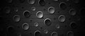 Technological background with holes. A dark gray circle with a glow. Modern dark abstract vector texture.