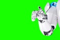 Technologically advanced modern robot points its finger on a green background. Neural networks and Artificial Intelligence,