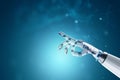 A technologically advanced modern robot points with its finger. Neural networks and Artificial Intelligence, technology. 3D