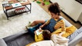 Technologies for kids. African american woman baby sitter entertaining caucasian cute little girl. Kid is drawing using