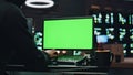 IT technologist coding chromakey computer at datacenter closeup. Man working Royalty Free Stock Photo