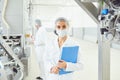 Technologist woman at food factory . Royalty Free Stock Photo