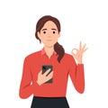 Technology, advertisement, communication, presentation concept. Young happy woman girl character shows smartphone with ok sign and Royalty Free Stock Photo