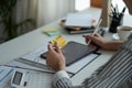 technology, asian woman online shopping concept - happy smiling woman with tablet pc computer and credit card at home Royalty Free Stock Photo