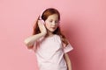 Technology audio music childhood children background cute little sound girl portrait listen person Royalty Free Stock Photo