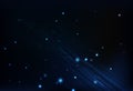 Technology of blue circuit glowing with particles and network ma