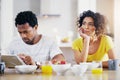 Technology, breakfast and man ignore woman for social media, reading news and digital app in morning. Marriage, couple Royalty Free Stock Photo