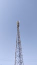 Technology communication mobile tower standing under clear blue sky showing modern network connection Royalty Free Stock Photo