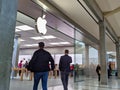 Technology crazed customers shopping inside an Apple store, scoping out iPhones and iMacs before Black Friday 2019