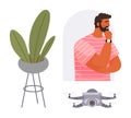 Technology enthusiast thinking next to an indoor plant and modern quadcopter concept visualization Royalty Free Stock Photo