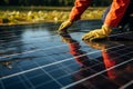 Technology for the future Man cleaning solar panel for green energy