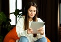 Technology helps work from home. Freelancer in bag chair