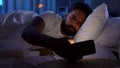 sleeping man awaking beacuse of phone at night