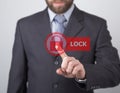 Technology, internet and networking concept. man in a black business shirt. woman presses lock button on virtual screens Royalty Free Stock Photo